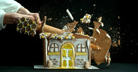 Gingerbread house smashed by rolling pin in super slow motion 스톡 동영상 261117458