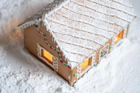 Gingerbread house in snow Stock Photos