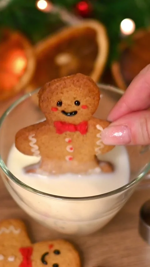 Gingerbread man into a cup Stock Footage 294936993