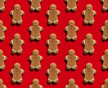Gingerbread man pattern red seamless background Stock Photos