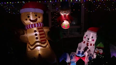 Gingerbread Man Polar Bear Christmas Nutcracker Lights Decoration Inflatable Stock Footage 295815228