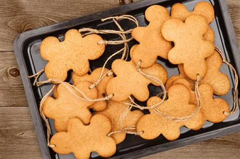 Gingerbread Men On Dark Background Stock Photos