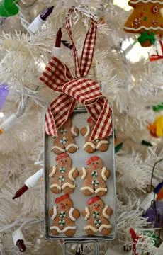 Gingerbread men on pan Stock Photos