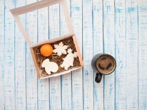 Gingerbread in packaging and coffee on an old table in French style Stock Photos