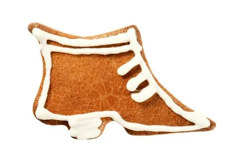 Gingerbread shoe cookie with white icing trim Fotos de archivo