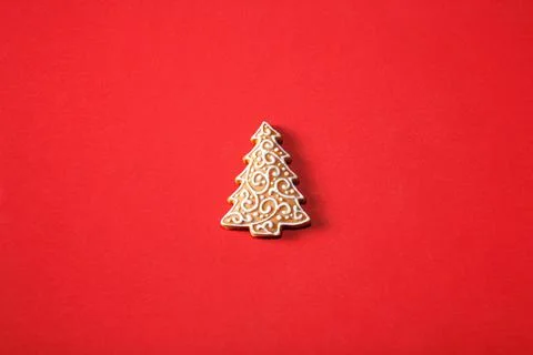 Gingerbread tree on a red background. The basis for the design of the poster  Stock Photos
