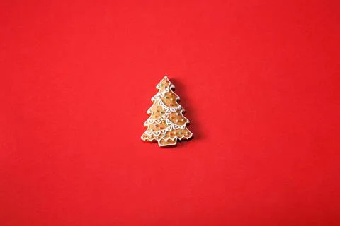 Gingerbread tree on a red background. The basis for the design of the poster  Stock Photos