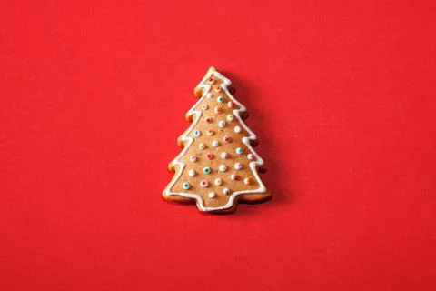 Gingerbread tree on a red background. The basis for the design of the poster  Stock Photos