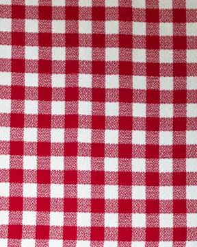 Gingham. Red and white checkered fabric made of cotton. Stock Photos
