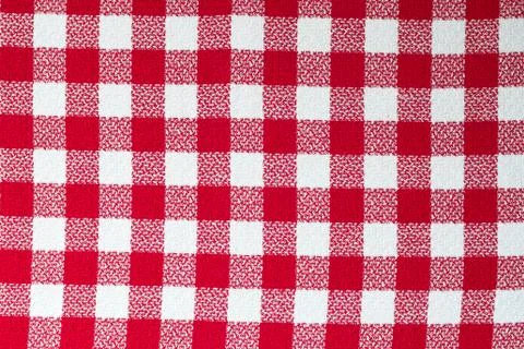 Gingham. Red and white checkered fabric made of cotton. Stock Photos