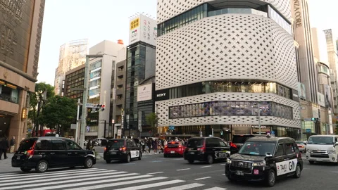 Ginza Place building and intersection in fancy shopping district. Tokyo, Japan. Stock Footage 247663442