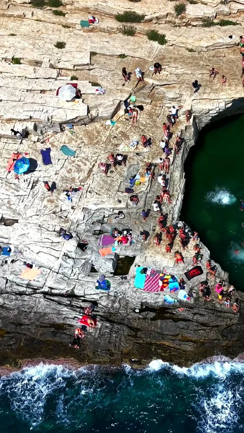 Giola natural pool, top down pull back over the sea, Thassos, vertical Stock-Footage 347178596