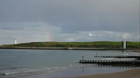 Girdleness Lighthouse and rainbow in the North Sea Aberdeen, Scotland, UK Stock Footage 67444037