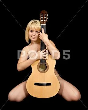 Girl with acoustic guitar Stock Photos