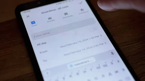 Girl is Adding a New Event in Electronic Calendar App on Smartphone Screen Stock Footage 246978879
