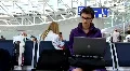 Girl in airport with notebook HD Footage