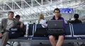 Girl in airport with notebook HD Footage