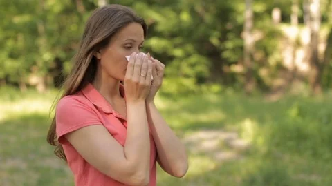 A girl with an allergy to summer pollen Stock Footage 76166316