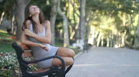 Girl and bench Stock Footage