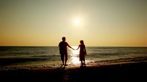 Girl And Boy Go Holding Hands From Sea Stock Video Pond5