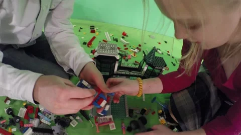 Girl and boy playing constructor. Stock-Footage 59661546