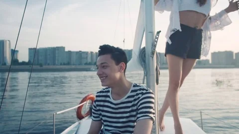 Girl and guy romantic on a yacht Stock Footage