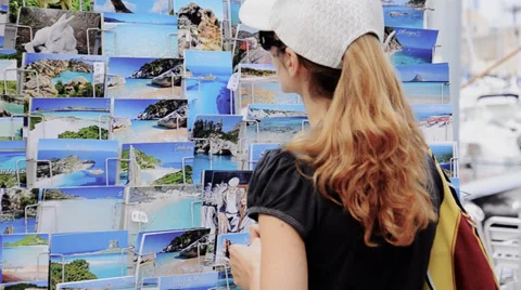 Girl and postcards 스톡 동영상 33211334