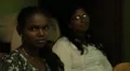 Girl and woman smiling at a gathering in Sri Lanka HD Footage