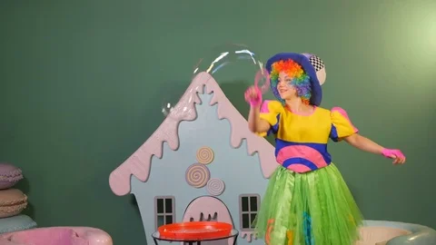 Girl animator lets bubbles happy Stock Footage 76930561