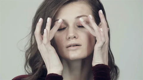Girl apply foundation on the face. Stock Footage 120793230