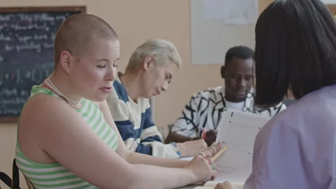 Girl Asking Groupmate to Help during Test in Computer Science Class Stock Footage 257070407