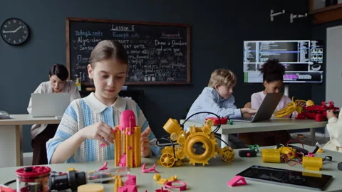 Girl Assembling Robot Model in Stem Education Class Stock Footage 339202780