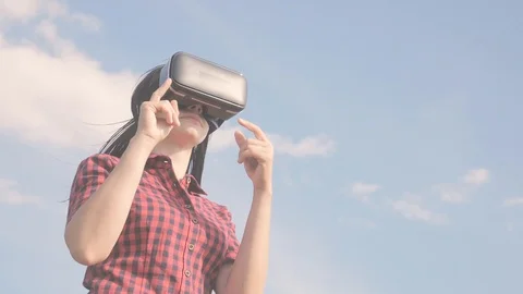 Girl Augmented future reality device creating virtual space concept slow motion Stock Footage 117115347