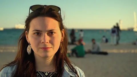 Girl awkwardly looking into camera Stock Footage 78365833