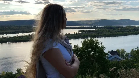 Girl on a background of mountains Stock Footage 115641173