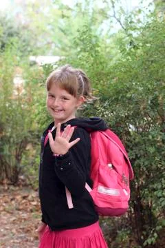 Girl with a backpack Stock Photos
