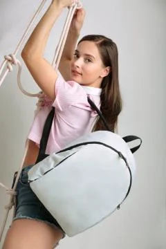 Girl with a backpack Stock Photos
