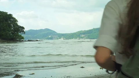 Girl With A Backpack Standing In Front Of A Ocean Stock Footage 70725017
