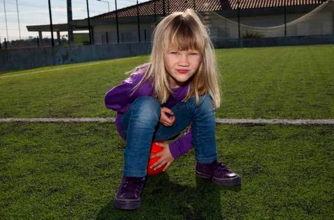 Girl with a basketball Stock Photos