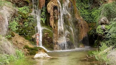 Girl bathing in a natural space Stock Footage 80222491