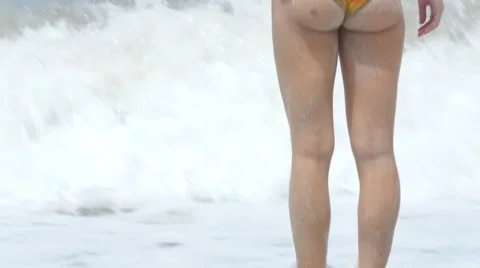 Girl on beach in bikini Stock Footage 60648504