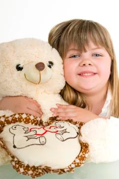 Girl with bear Stock Photos