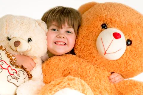 Girl with bear Stock Photos