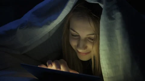 Girl on the bed with tablet. Stock Footage 58894045
