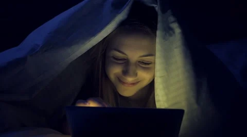 Girl on the bed with tablet. Stock Footage 58894112