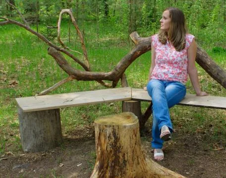 Girl on bench Stock Photos