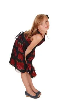 Girl bending down. Stock Photos