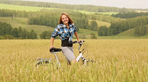 Girl With Bicycle Stock Footage 44455310