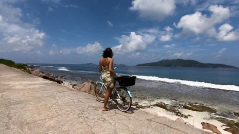 A girl with a bicycle. Stock Footage 101975165