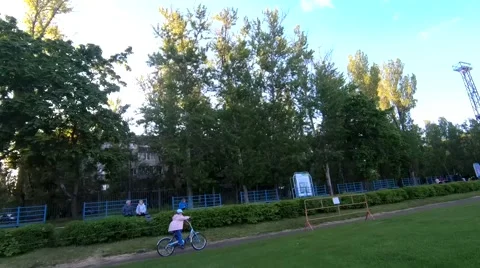 A girl on a bicycle Stock Footage 196817565